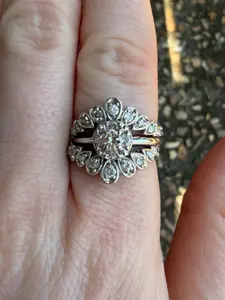 Unique floral-inspired halo design Engagement Ring