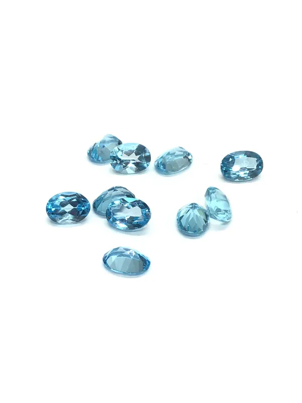 Blue topaz gemstones from auction in Springfield, Missouri — image 46