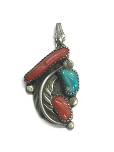 Eustace Zuni turquoise and red coral pendant