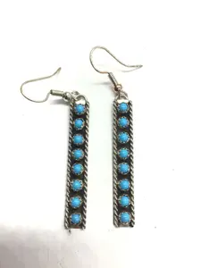 Esther White Navajo Kingman turquoise earrings