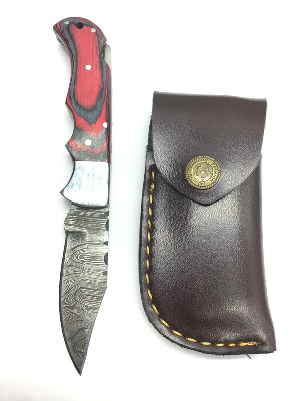 Damascus folding knife from auction in Springfield, Missouri — image 16