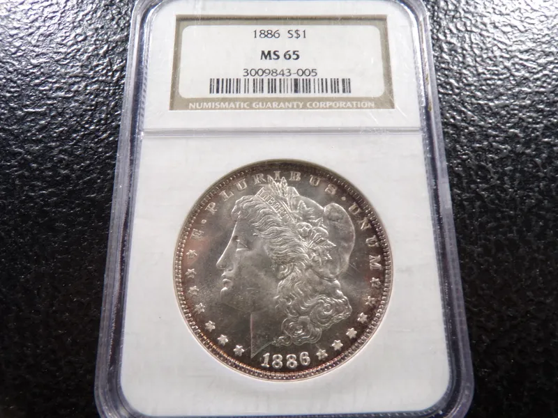 1886 NGC MS65 HIGH GRADE MORGAN SILVER DOLLAR from auction in Englewood, Ohio — image 6
