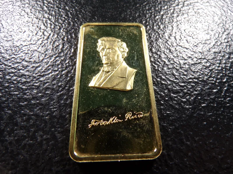 1 OUNCE .999 FINE SILVER FRANKLIN PIERCE SILVER BAR GOLD COLORED from auction in Englewood, Ohio — image 40
