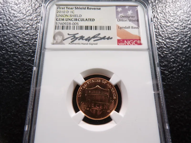 2010-D NGC GEM UNC. SIGNED FIRST YEAR UNION SHIELD REVERSE LINCON SHIELD CENT from auction in Englewood, Ohio — image 11