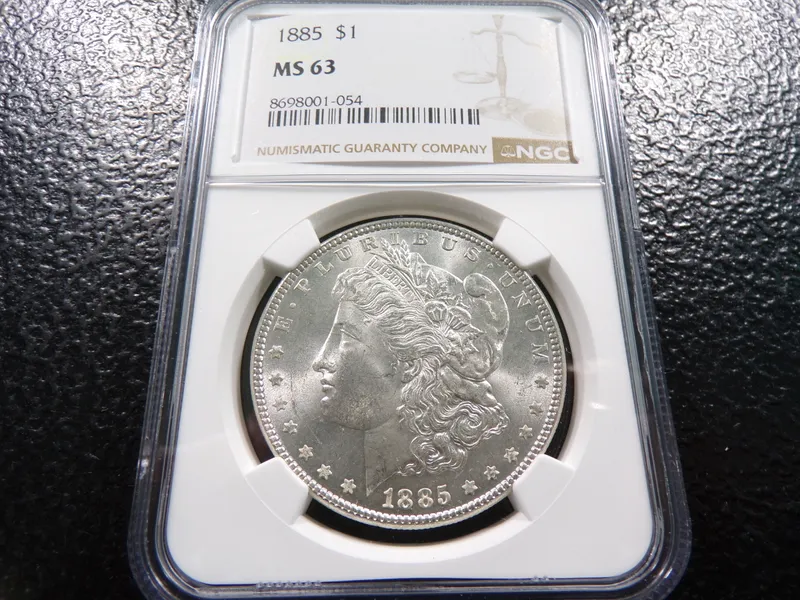 1885 NGC MS63 MORGAN SILVER DOLLAR from auction in Englewood, Ohio — image 22
