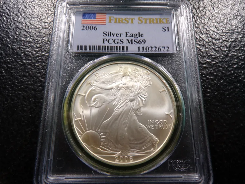 2006 PCGS MS69 FIRST STRIKE AMERICAN SILVER EAGLE DOLLAR from auction in Englewood, Ohio — image 36