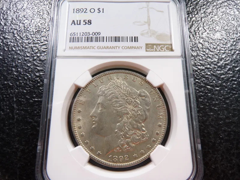 1892-O NGC AU58 MORGAN SILVER DOLLAR from auction in Englewood, Ohio — image 3