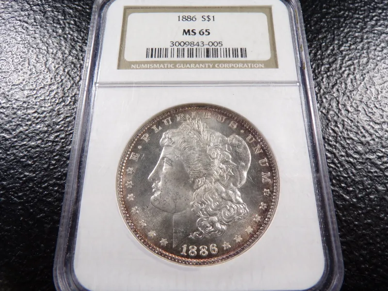 1886 NGC MS65 HIGH GRADE MORGAN SILVER DOLLAR from auction in Englewood, Ohio — image 2