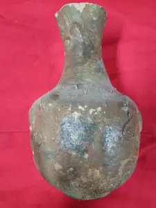 A lead-glazed earthenware garlic-mouth vase, Han dynasty (206 B.C.-A.D. 220)