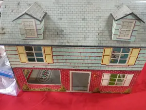 Two Story Lithographed Tin Colonial Dollhouse with Plastic Furniture