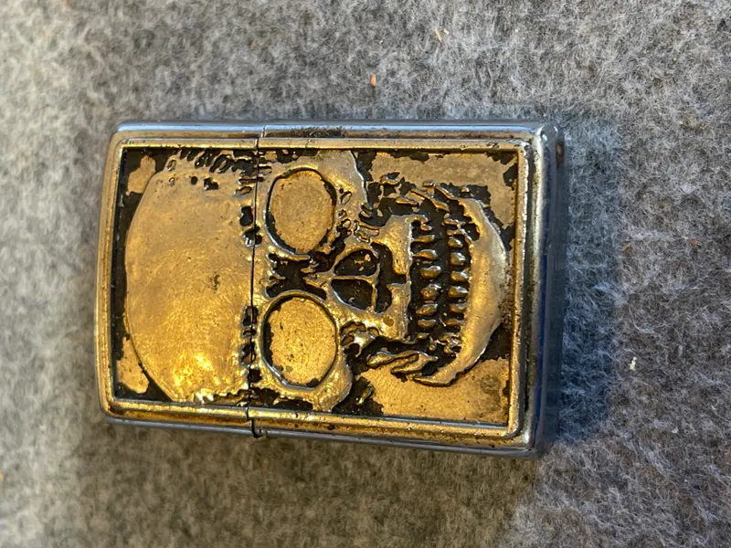 Zippo Chrome Windproof Lighter with Raised Skull Emblem from auction in Brewton, Alabama — image 4