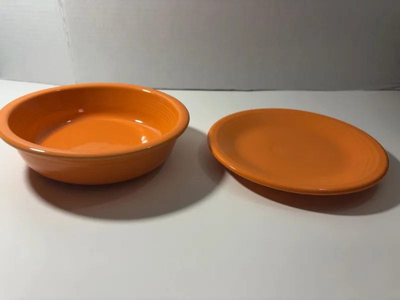 A Pair of Homer Laughlin Fiesta Tangerine Ceramic Tableware from auction in Brewton, Alabama — image 23