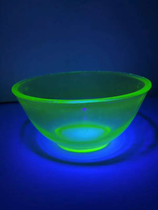 Large Green Uranium Glass Mixing Bowl 
Does have some scratches and chips around rim. NO CRACKS from auction in Brewton, Alabama — image 43