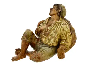 ITALIAN POLYCHROME TERRACOTTA FIGURE OF A SLEEPING BOY