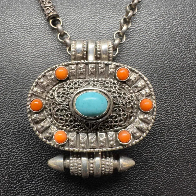 Tibetan Gau Prayer Pill Trinket Box Pendant Sterling Silver Turquoise Red Coral Necklace from auction in Orlando, Florida — image 13