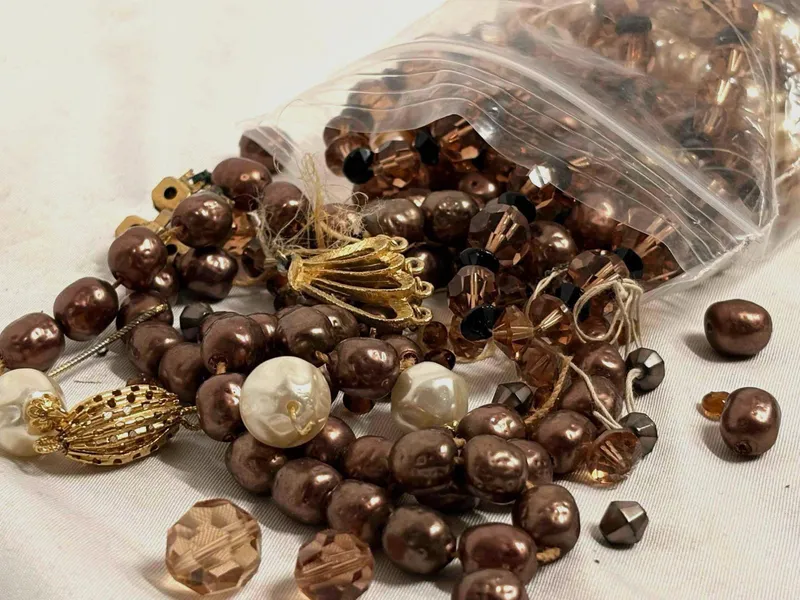 14 Plus Ounces of Bronze Toned Charms, Beads, Broken Costume Jewelry and More from auction in Orlando, Florida — image 44