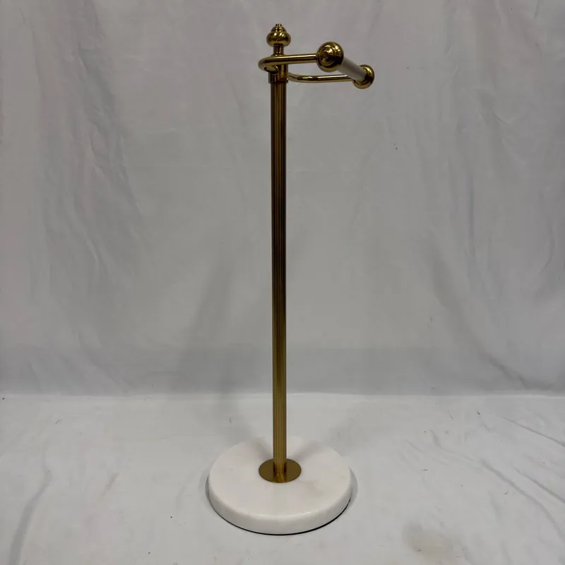 Freestanding Brushed Brass Style Toilet Paper Holder with White Faux Marble Base from auction in Orlando, Florida — image 35