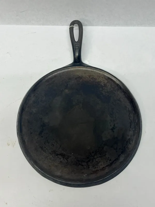 Griswold No. 8 Round Cast Iron Griddle from auction in Dundee, Ohio — image 36