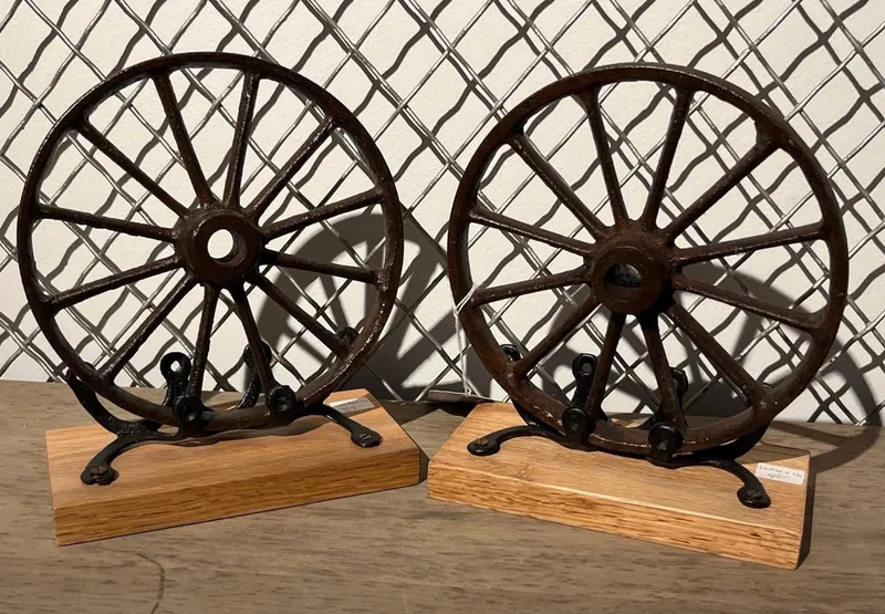Pair Cast Iron Wheel Bookends on Oak from auction in Dundee, Ohio — image 6