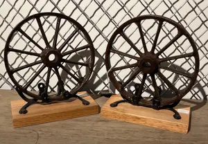 Pair Cast Iron Wheel Bookends on Oak