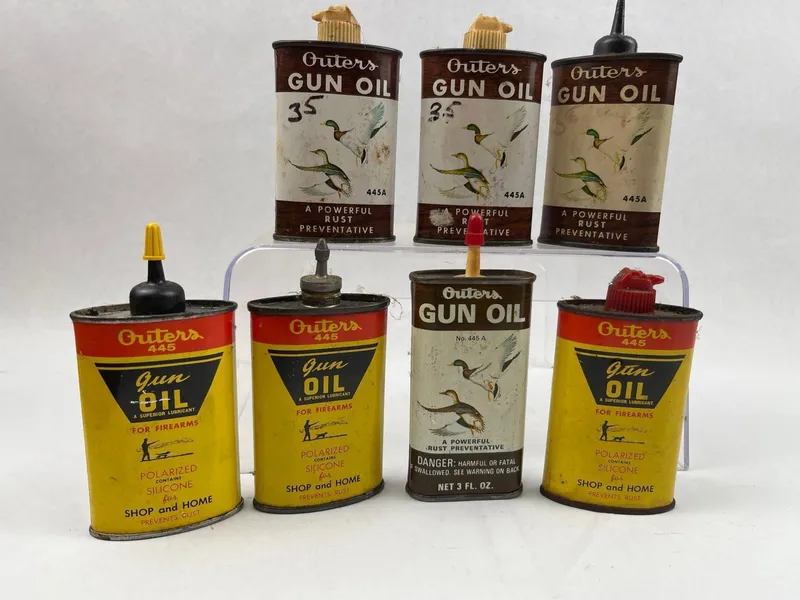 Outers Gun Oil & Rust Preventative Tins from auction in Dundee, Ohio — image 18