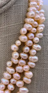 Luminous Triple Strand Blushing Apricot Teardrop Baroque Freshwater Pearl Necklace