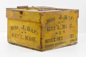 Yellow painted wooden egg crate