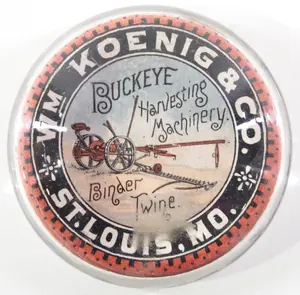 Buckeye Harvesting Machines paperweight