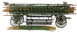 Early horse-drawn fire ladder wagon