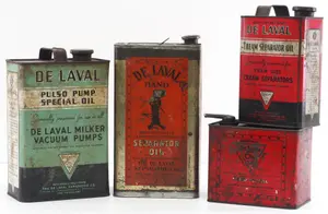 (4) DeLaval oil tins