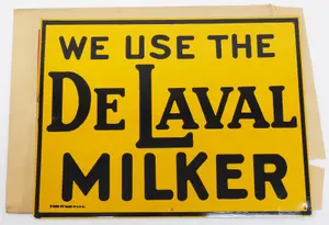 We Use the DeLaval Milker sign