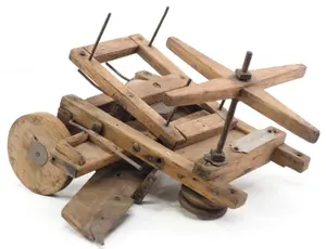 Early wooden model of farm implement