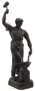Spelter blacksmith statue with brass tag
