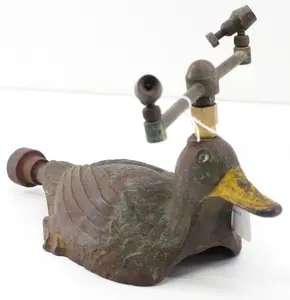 Cast iron duck-shaped sprinkler