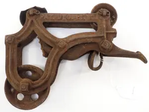 Small Loudens cast iron hay car
