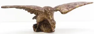 Cast iron eagle with red and gold paint