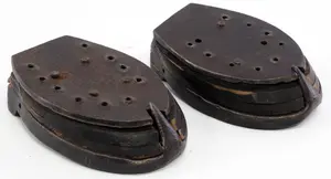 Set of horse shoes with wooden pads