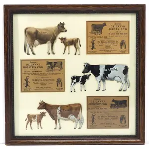 1930's set of DeLaval tin cow & calf sets