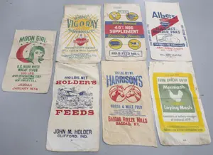 (6) Feed bags & (1) flour bag