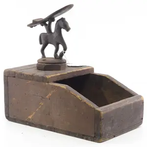 Early shoe shine box with horse foot rest