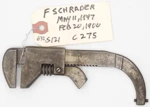 E. Schrader without nub on jaw