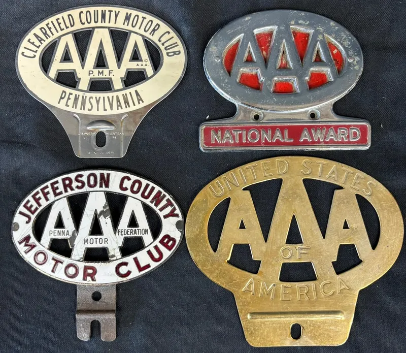 Lot 4 Porcelain & Stamped Metal AAA License Plate Toppers from auction in Jackson, Michigan — image 11