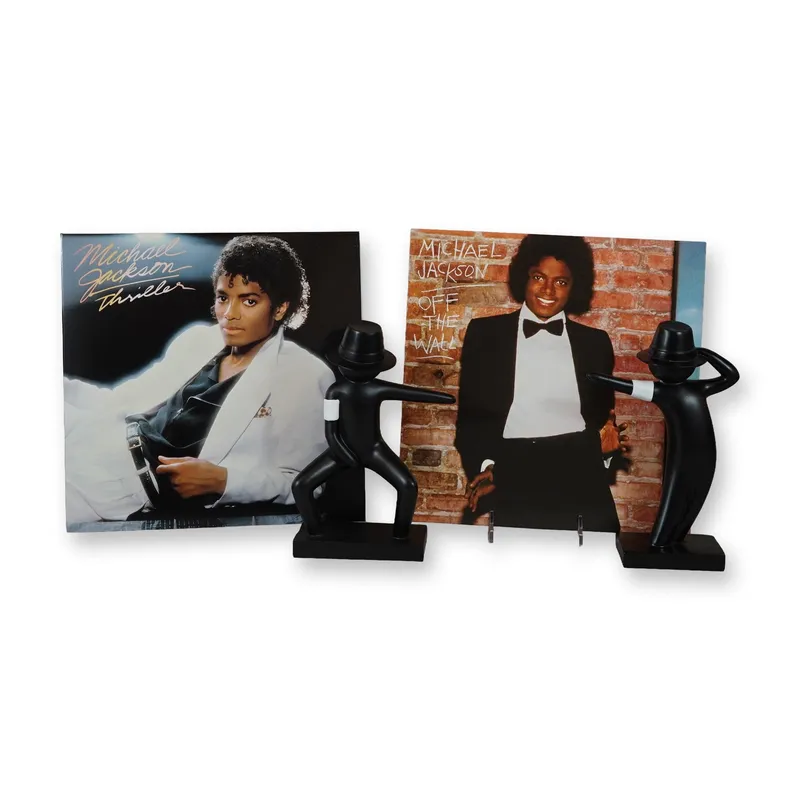 Four-Piece Collection of Michael Jackson LP Vinyls and Figurines from auction in Hollywood, Florida — image 11