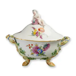 An Important Meissen Porcelain Figural Soup Tureen and Cover Surmounted by a Putto,18th Century