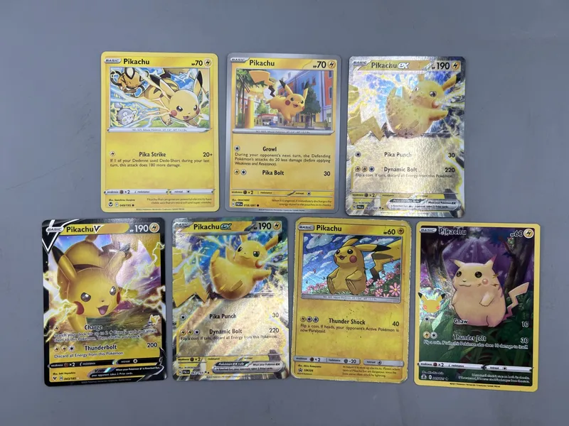 (7) Assorted Pokemon Pikachu Cards W/ EX & Full Arts - Varying Conditions from auction in Greenville, Ohio — image 5