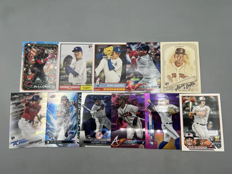 (11) Modern Baseball Star Player Rookie Cards W/ Parallels & Refractors - Elly De La Cruz, Yoshinobu Yamamoto, Adley Rutschman from auction in Greenville, Ohio — image 26