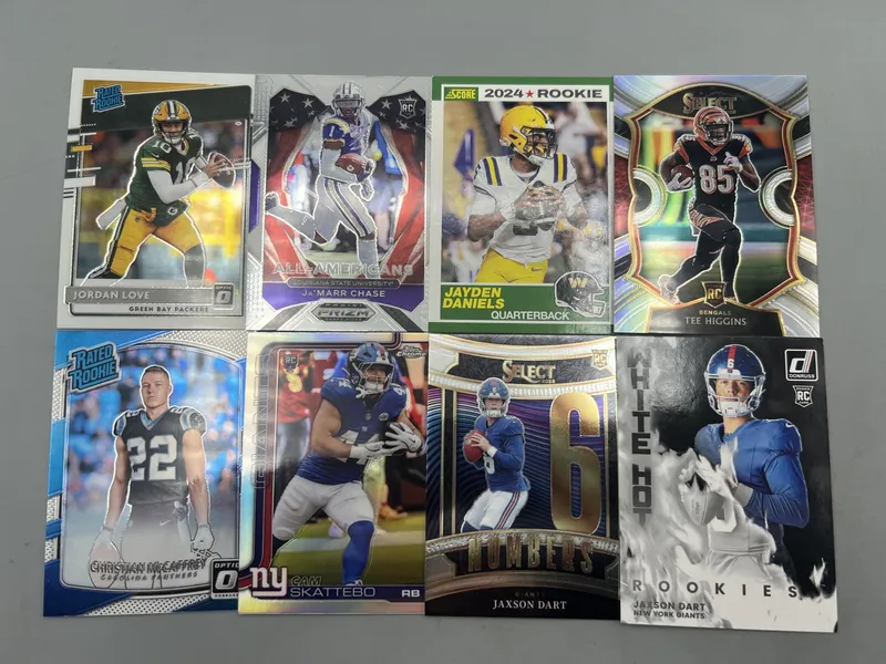 (8) Modern Football Star Player Rookie Cards - Jordan Love, Ja'Marr Chase, Jayden Daniels, Jaxson Dart from auction in Greenville, Ohio — image 28