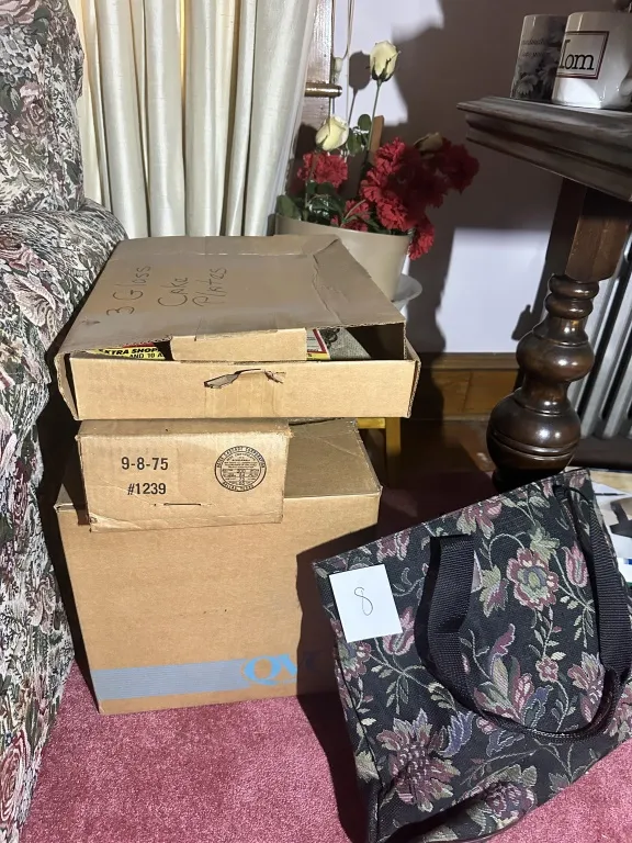 Box Lot Of Glass Plates & Silverplate estate box lot with glass cake plates, trays, candlestick, and assorted serving pieces. from auction in Clifford , Pennsylvania — image 5
