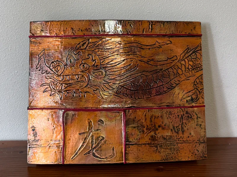 CATHERINE FOSTER, "CHINESE DRAGON" EMBOSSSED COPPER ON WOOD BASE from auction in Salem, Oregon — image 44