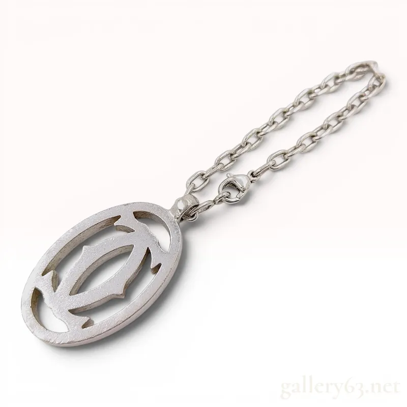 Cartier silver toned metal Double C logo bag charm from auction in Atlanta, Georgia — image 26